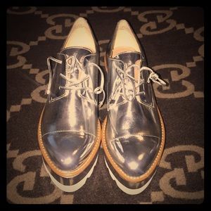 Silver DKNY Platforms